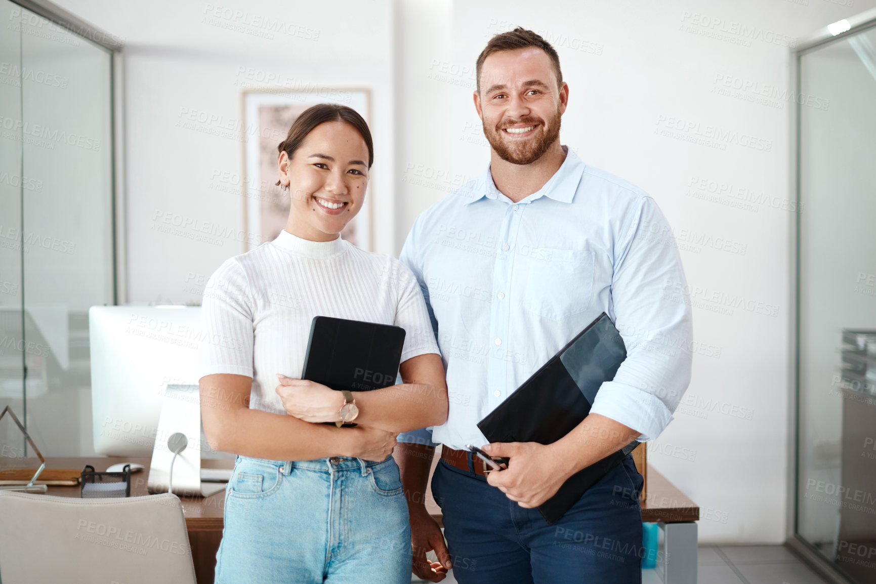 Buy stock photo Shot of two car salespeople together at work