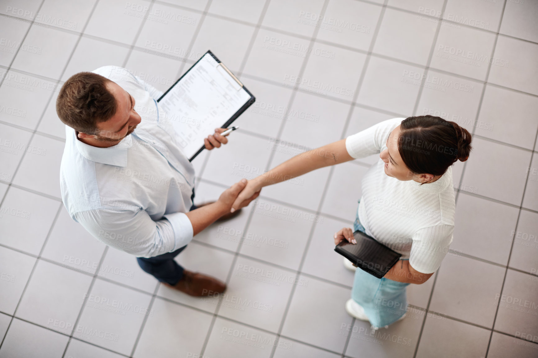 Buy stock photo Shot of a businessman shaking hands with his customer