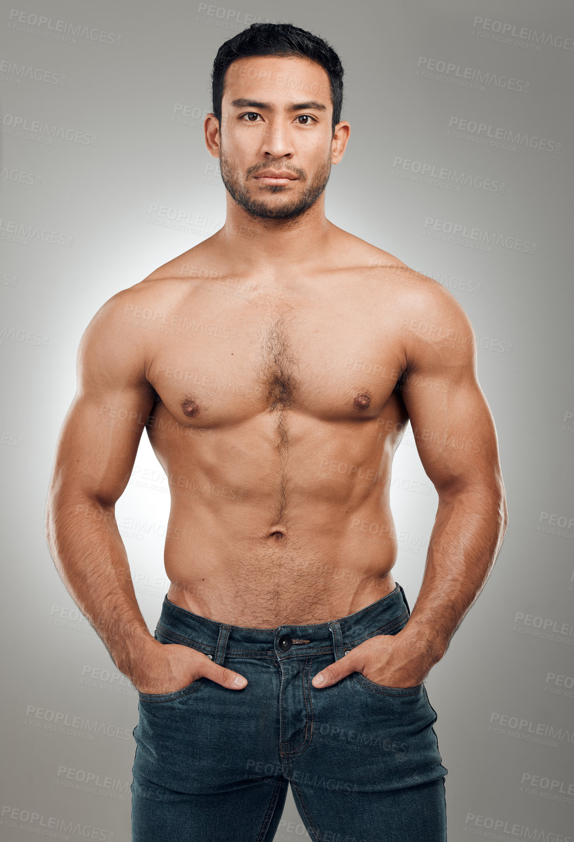 Buy stock photo Man, body and portrait in studio with abs or muscles, shirtless and grey background with model or bodybuilder. Jeans, strong chest and Asian male person on backdrop, confidence with six pack