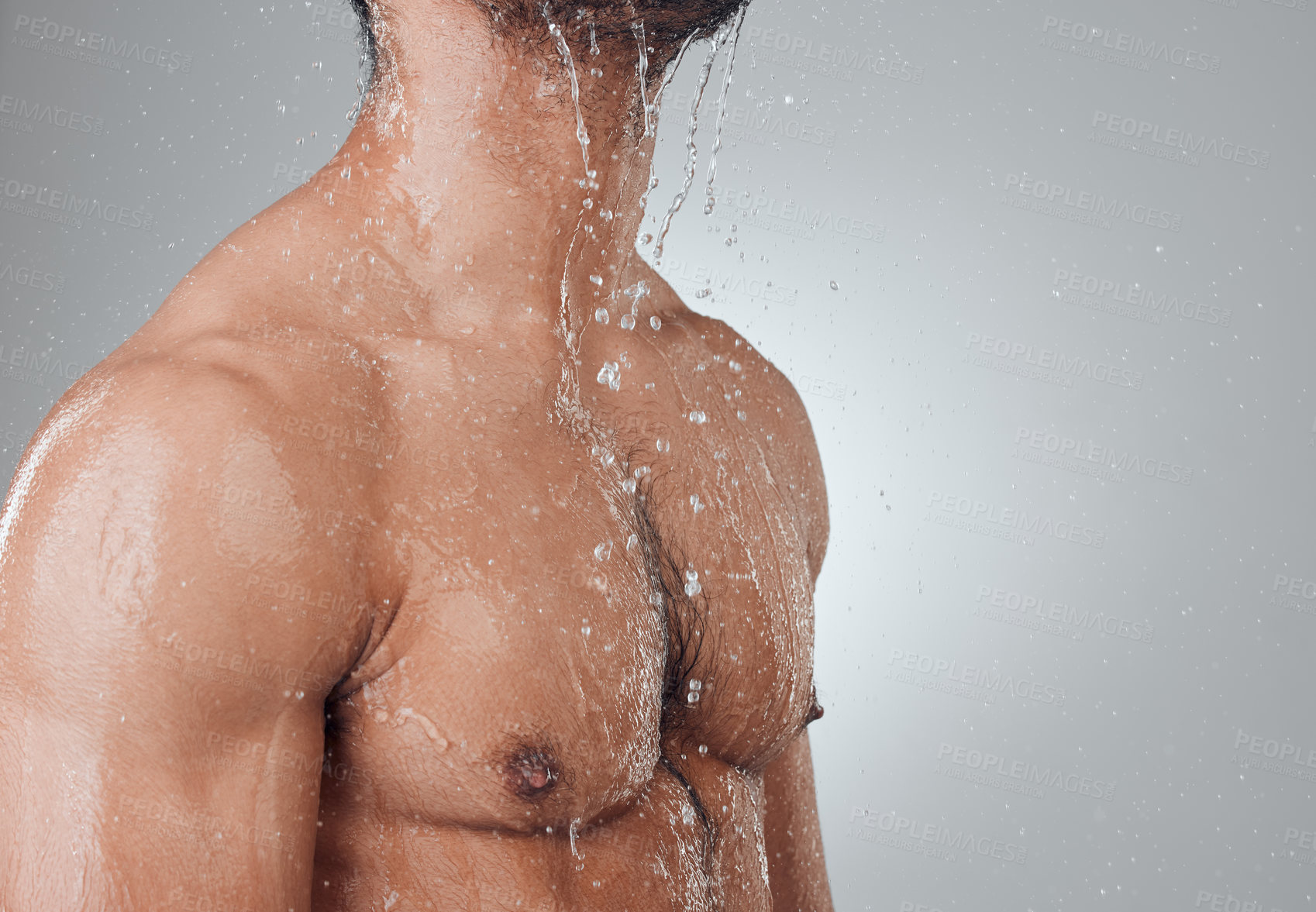 Buy stock photo Man, shower and washing in studio or chest, skincare and cleaning or grooming on gray background. Male person, cosmetics and liquid for treatment in morning routine, mockup and hygiene or beauty