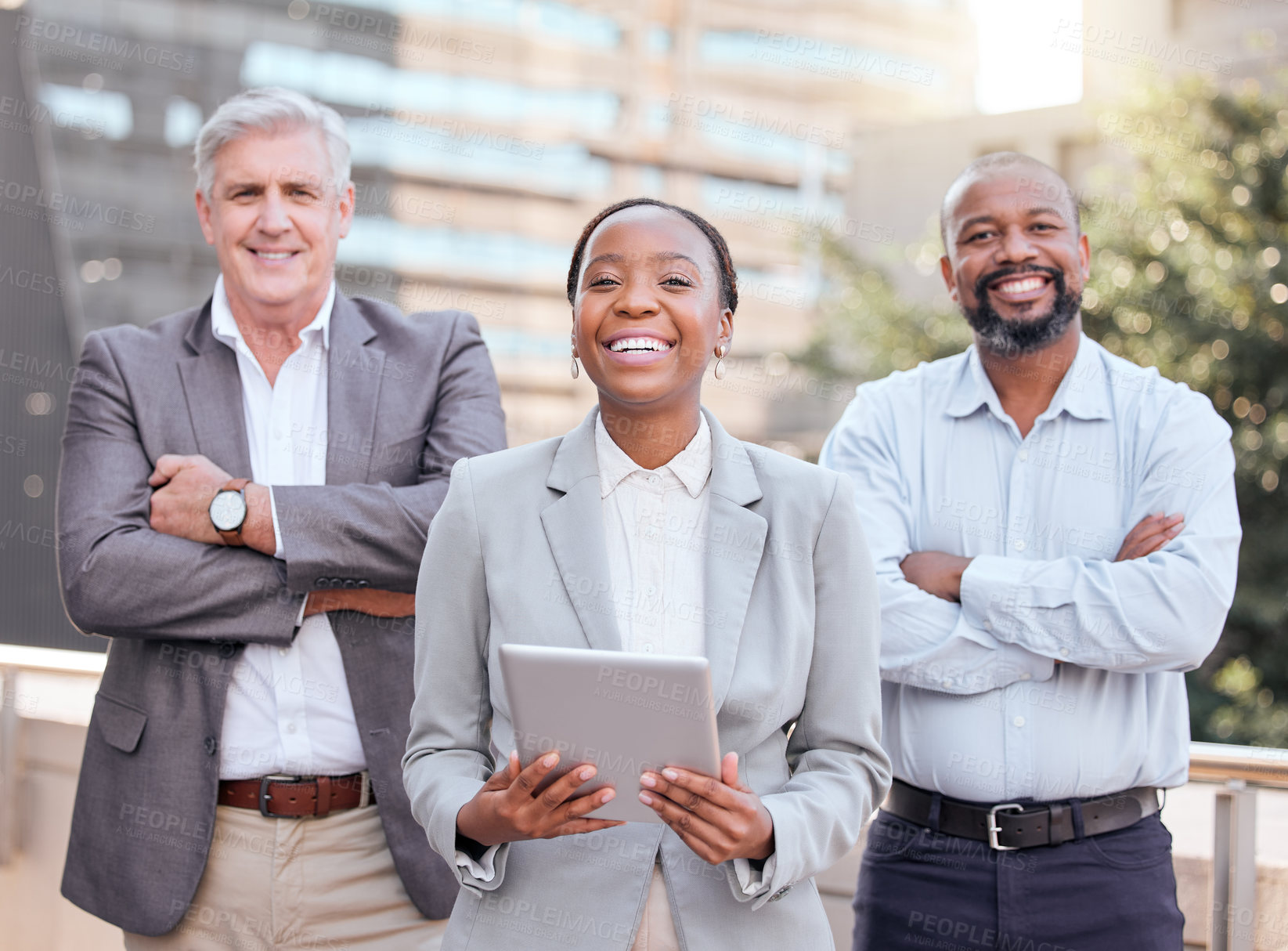 Buy stock photo Shot of a group of businesspeople standing outside together