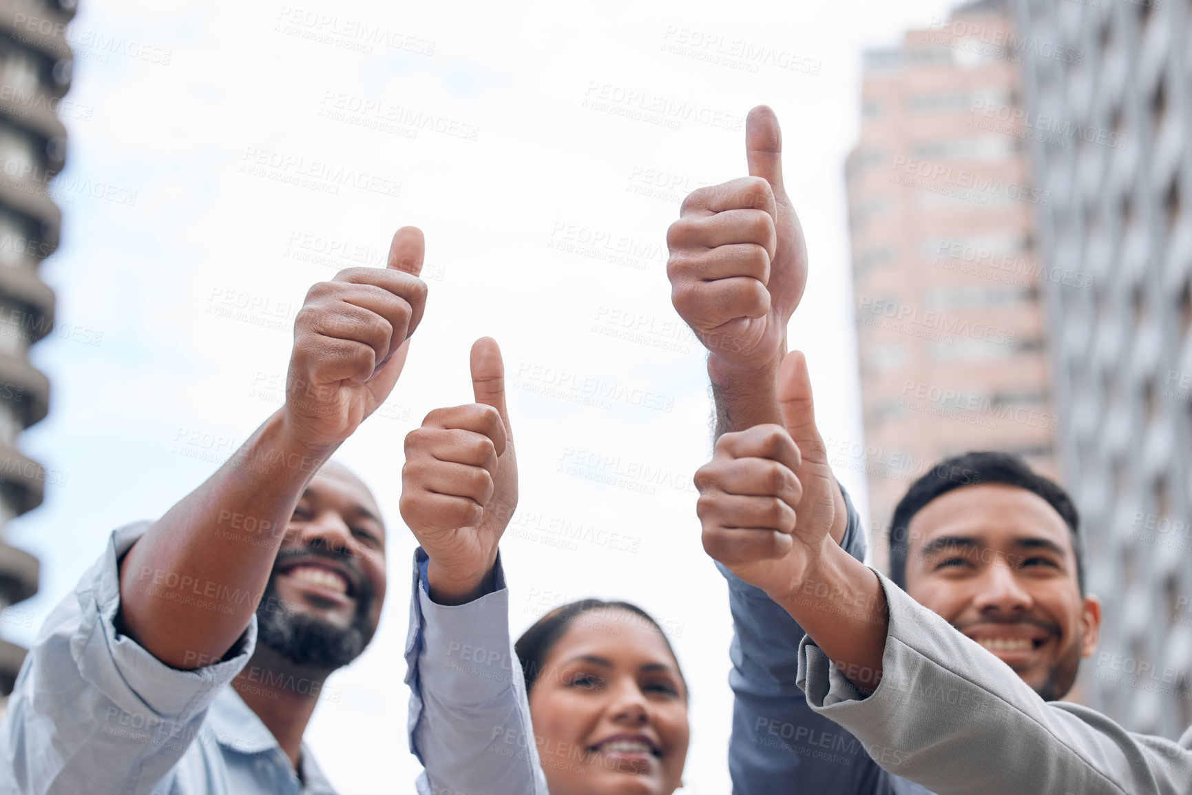 Buy stock photo Shot of a group of businesspeople giving the thumbs up