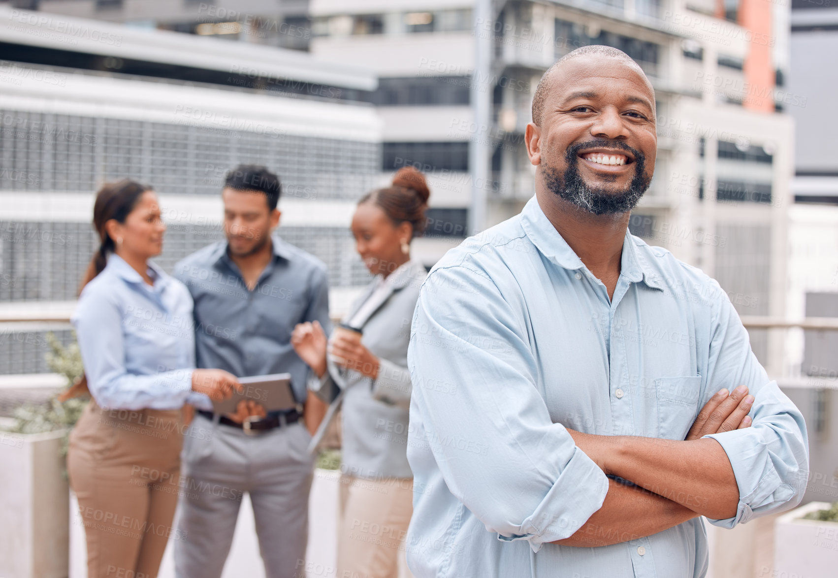 Buy stock photo Shot of a group of businesspeople standing outside together