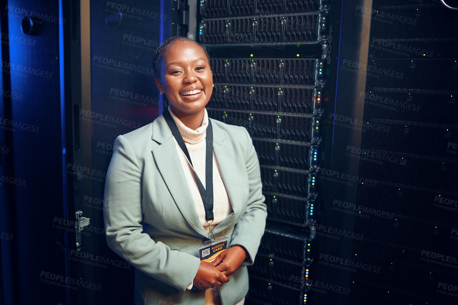 Buy stock photo Portrait of a young woman working in a server room