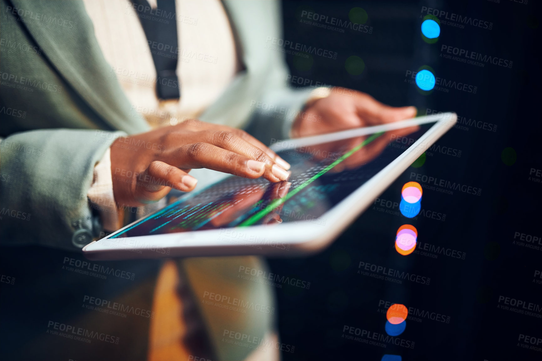 Buy stock photo Closeup shot of an unrecognisable woman using a digital tablet while working in a server room