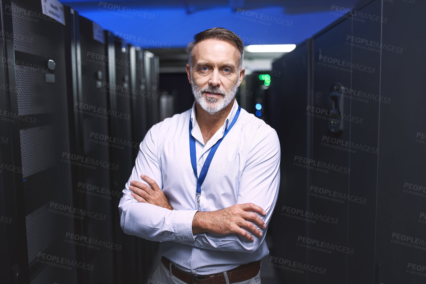 Buy stock photo Portrait of a mature man working in a server room