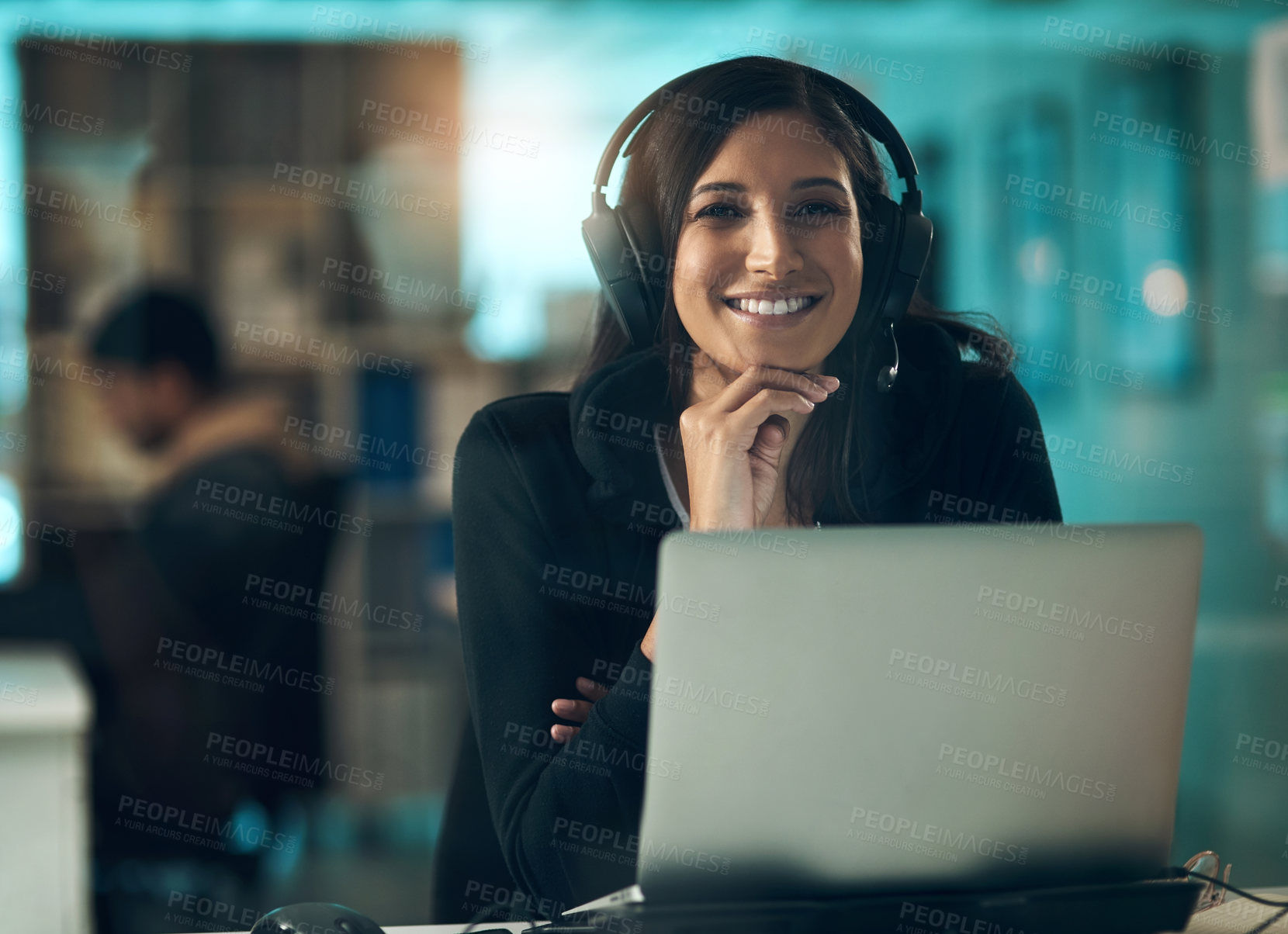 Buy stock photo Portrait of a young woman using a headset in a modern office