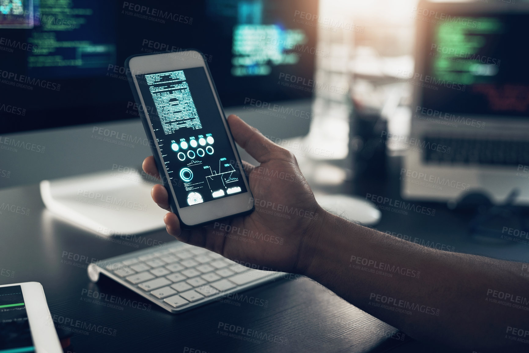 Buy stock photo Cropped shot of an unrecognizable man using a cellphone in a modern office