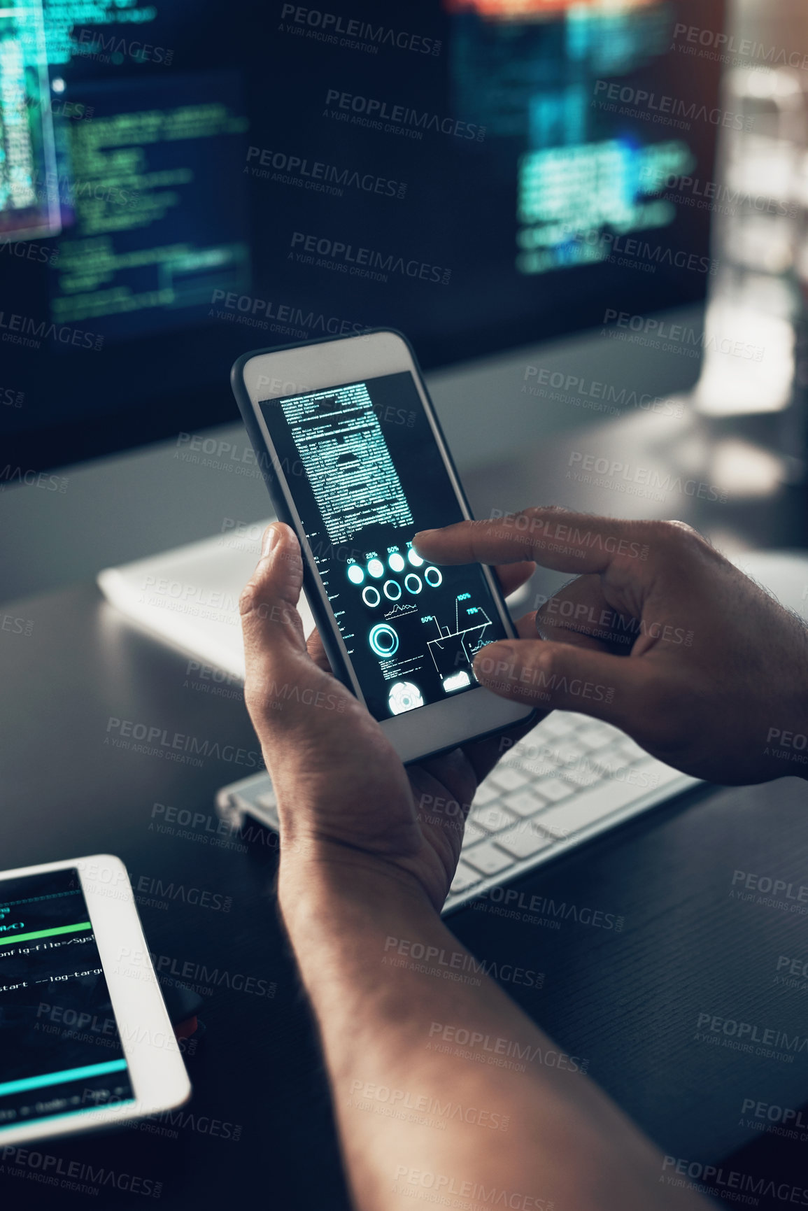 Buy stock photo Cropped shot of an unrecognizable man using a cellphone in a modern office