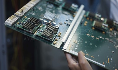 Buy stock photo Closeup shot of an unrecognizable woman checking a motherboard at work