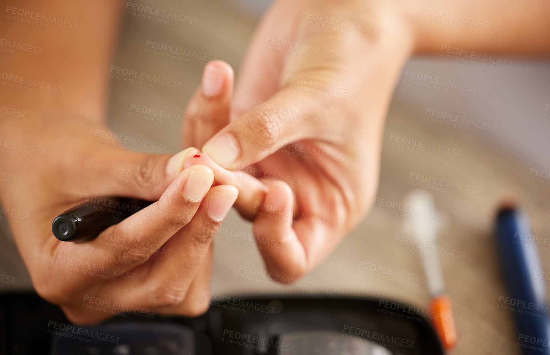 Buy stock photo Finger, diabetes and a person checking their insulin level in a home closeup for routine treatment. Hands, test and medical equipment with a diabetic adult taking a sample to check blood sugar