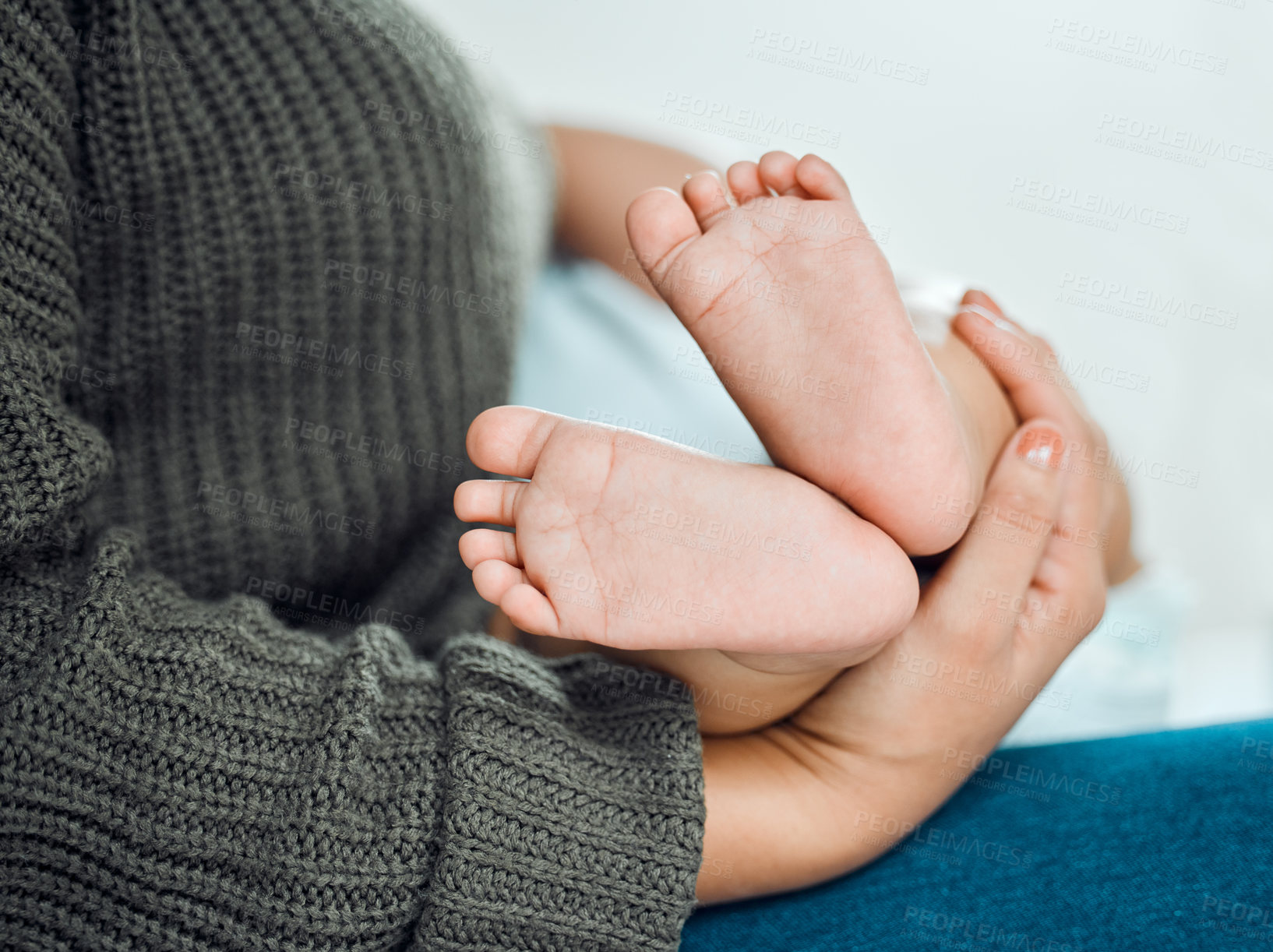 Buy stock photo Baby, hands and woman holding feet for growth, support and development in family home. Newborn, mother and wellness in bedroom for relax, security and together with love and care for kid and mom 