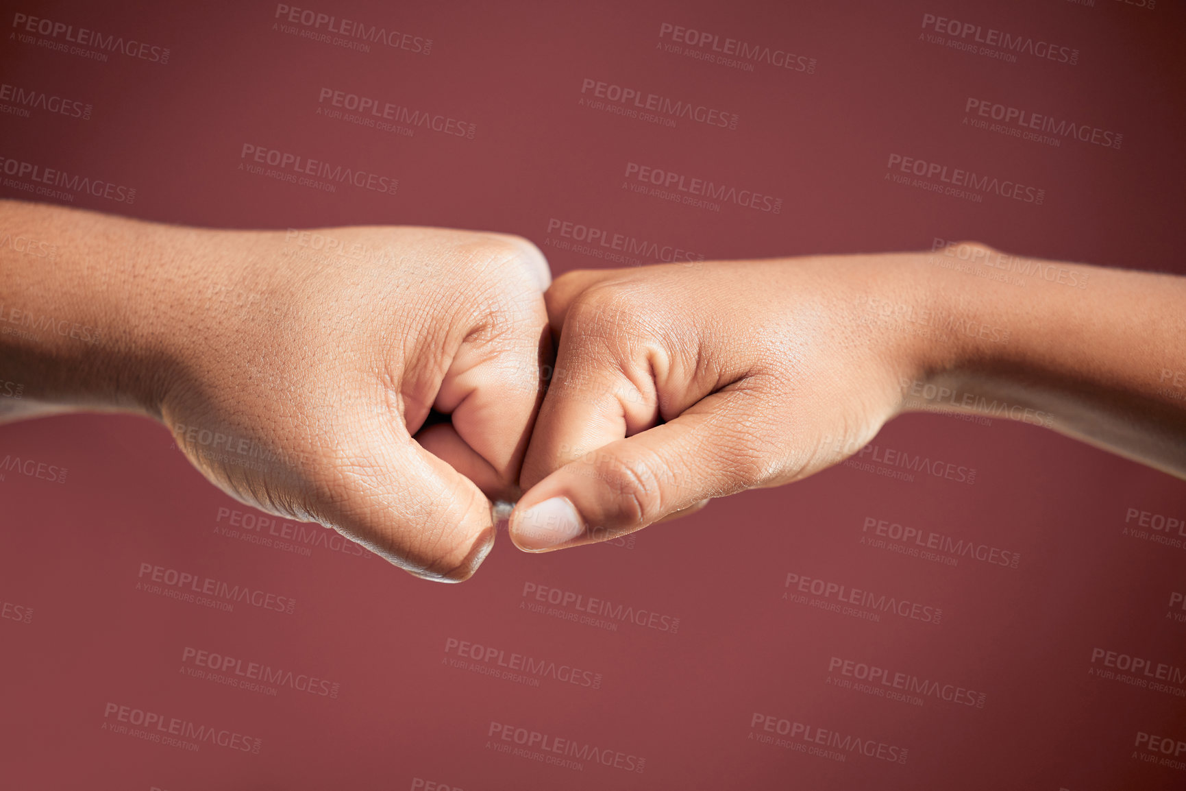 Buy stock photo Fist bump, people and teamwork in studio for agreement, collaboration or deal by red background. Person, partnership and welcome with respect, support or solidarity with trust, link and synergy