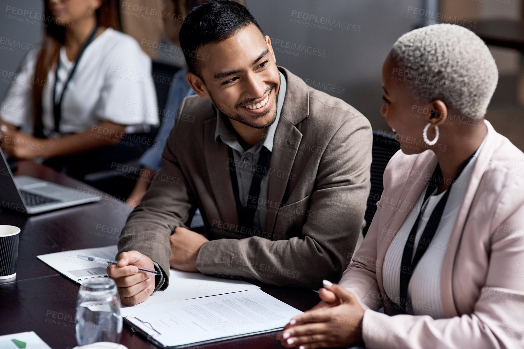 Buy stock photo Shot of a group of businesspeople having a meeting in a boardroom