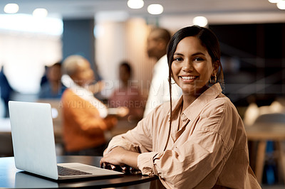 Buy stock photo Shot of a young businesswoman using a laptop at a conference