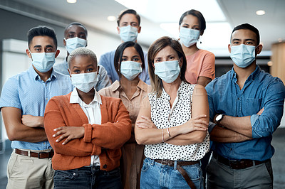 Buy stock photo Portrait of a group of masked and confident young businesspeople working together in a modern office