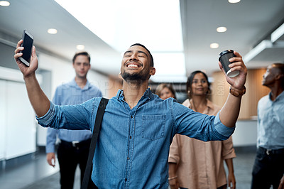 Buy stock photo Shot of a young businessman celebrating during a conference in a modern office