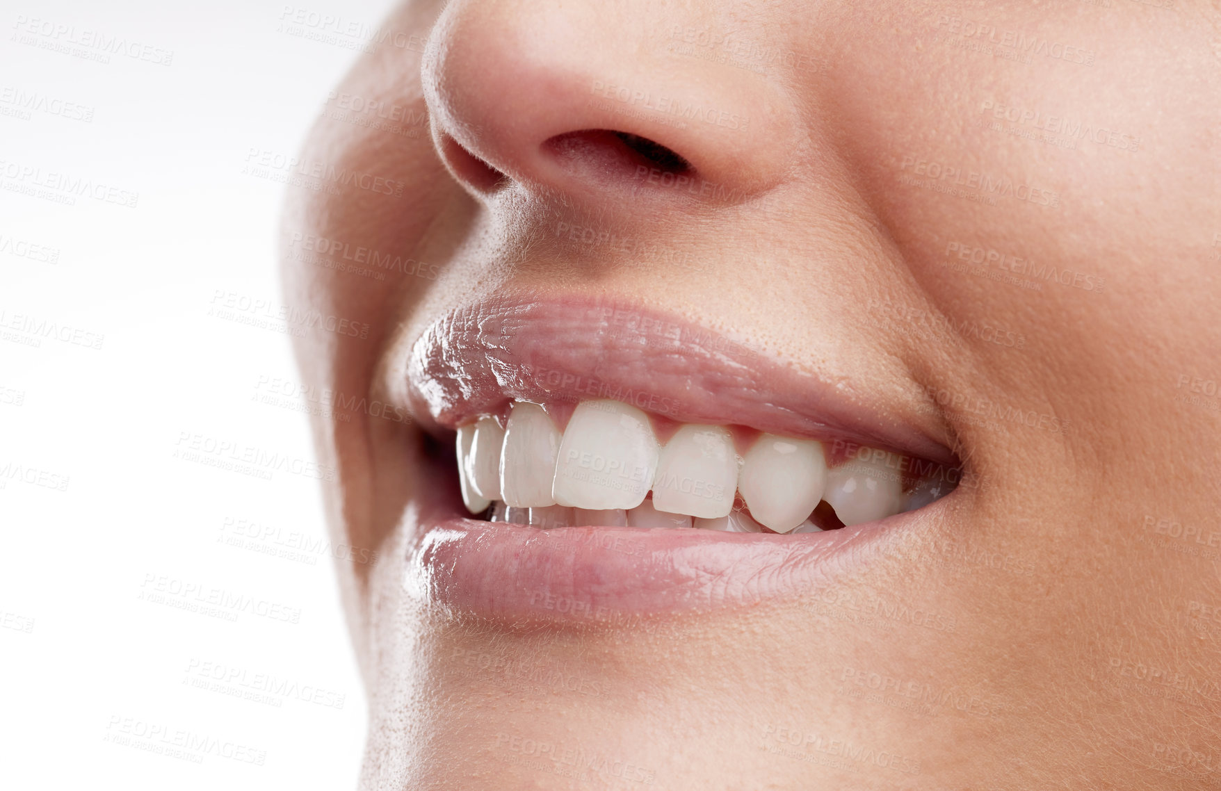 Buy stock photo Studio shot of a unrecognizable female smiling against a white background