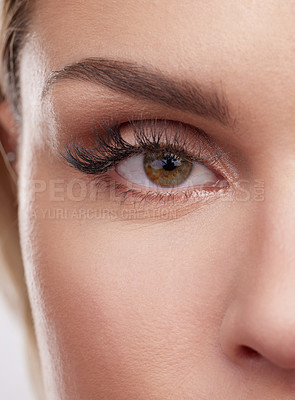 Buy stock photo Cropped studio shot of a beautiful young woman’s eyes