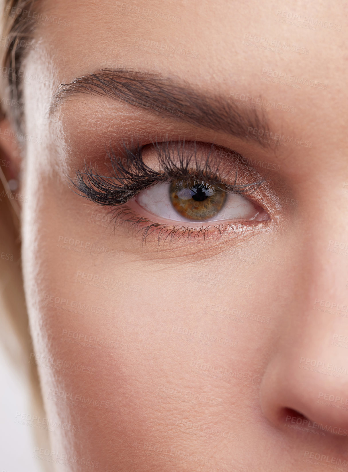 Buy stock photo Cropped studio shot of a beautiful young woman’s eyes