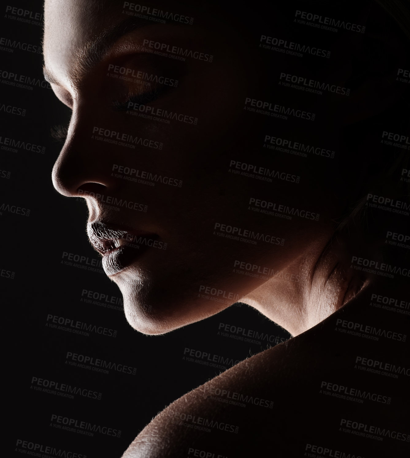 Buy stock photo Studio shot of a woman woman posing against a black background