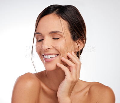 Buy stock photo Shot of an attractive young woman posing alone in the studio