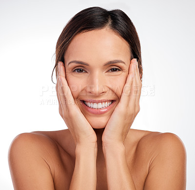 Buy stock photo Shot of an attractive young woman posing alone in the studio