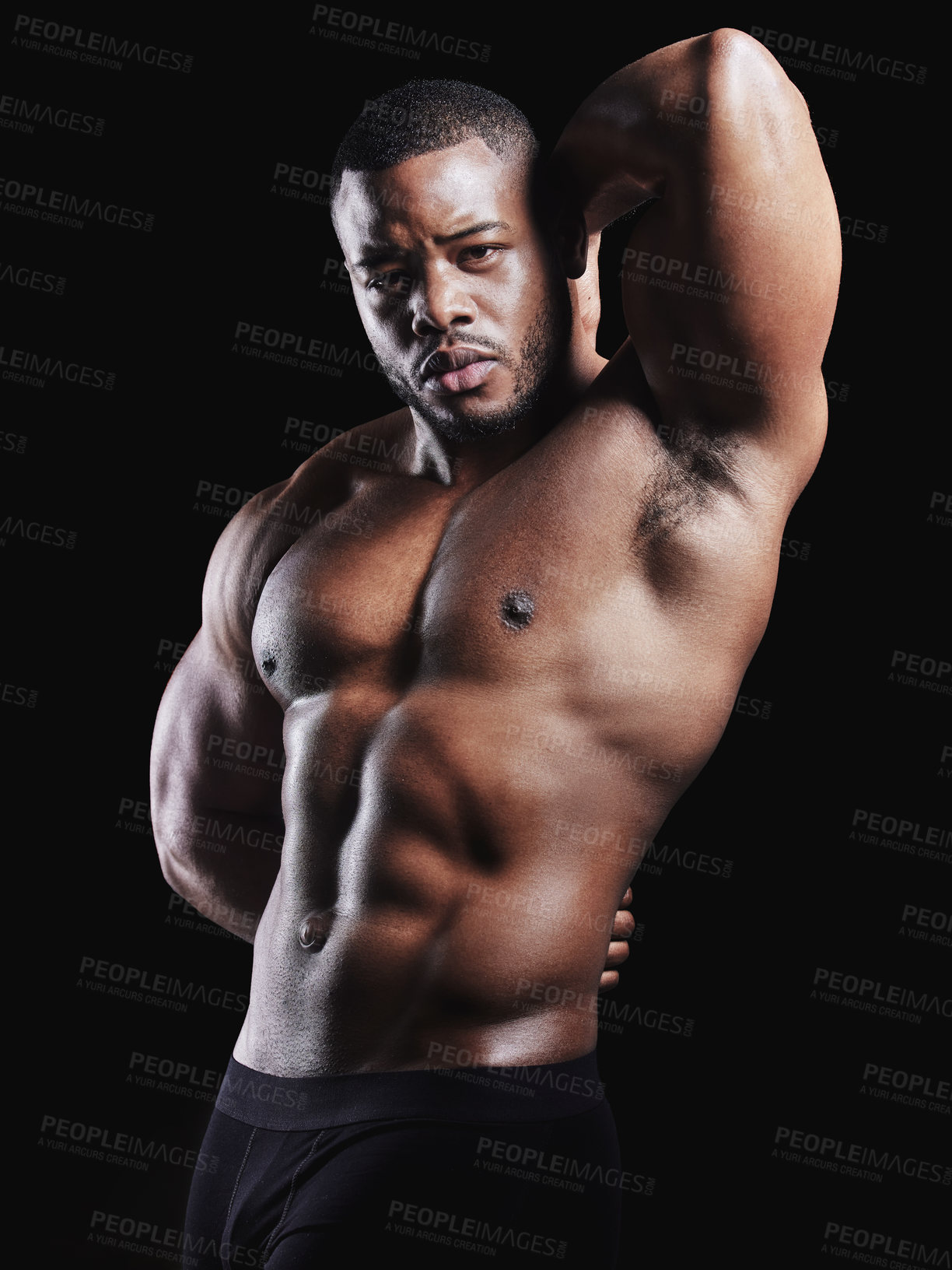 Buy stock photo Black man, portrait and abdomen in studio for exercise, strong bodybuilder or training for wellness. Male athlete, dark background or confidence for topless workout, stomach with muscle for gym sport