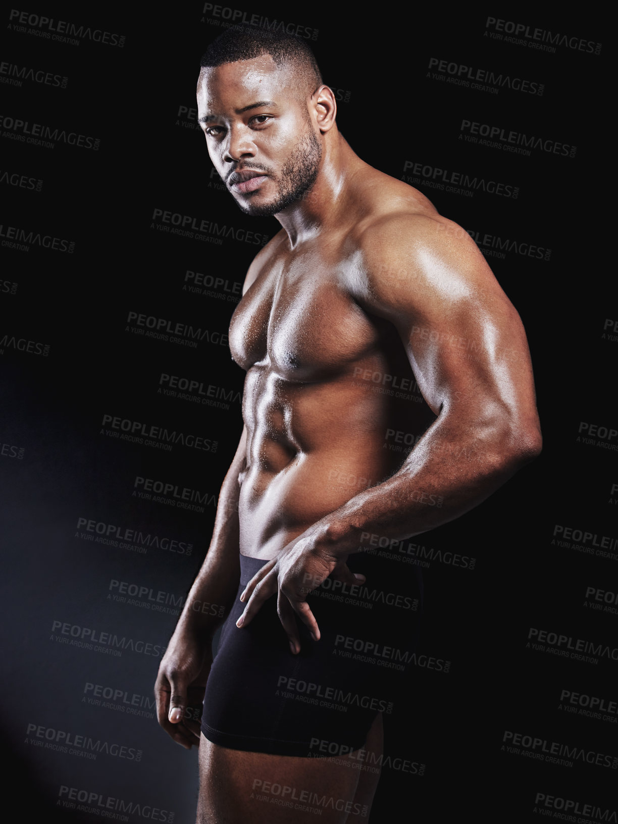 Buy stock photo Portrait, bodybuilder and black man with pride for fitness, health and body care in studio. African athlete, confidence and muscles or biceps by dark background for wellness, training and results