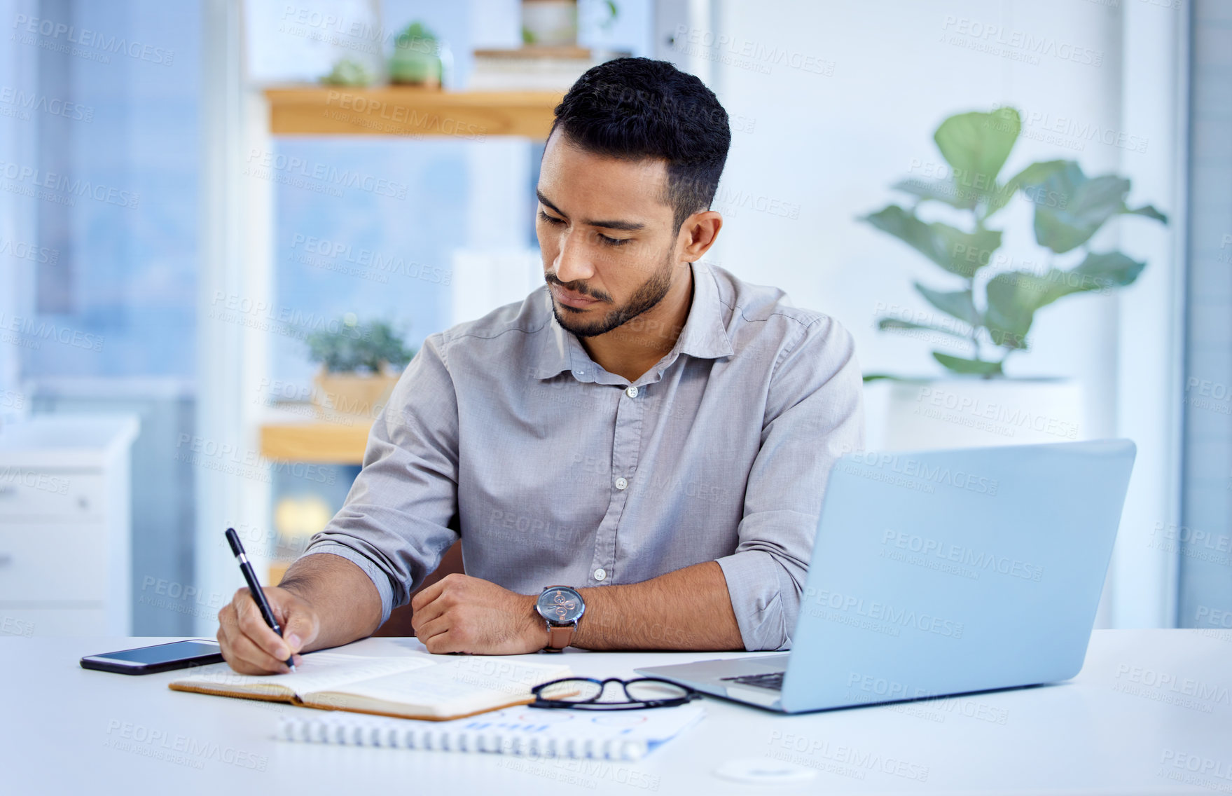 Buy stock photo Young business man, writing and book with laptop, notes or schedule planning at web design job. Businessman, notebook and computer with ideas, brainstorming or problem solving for report in workplace