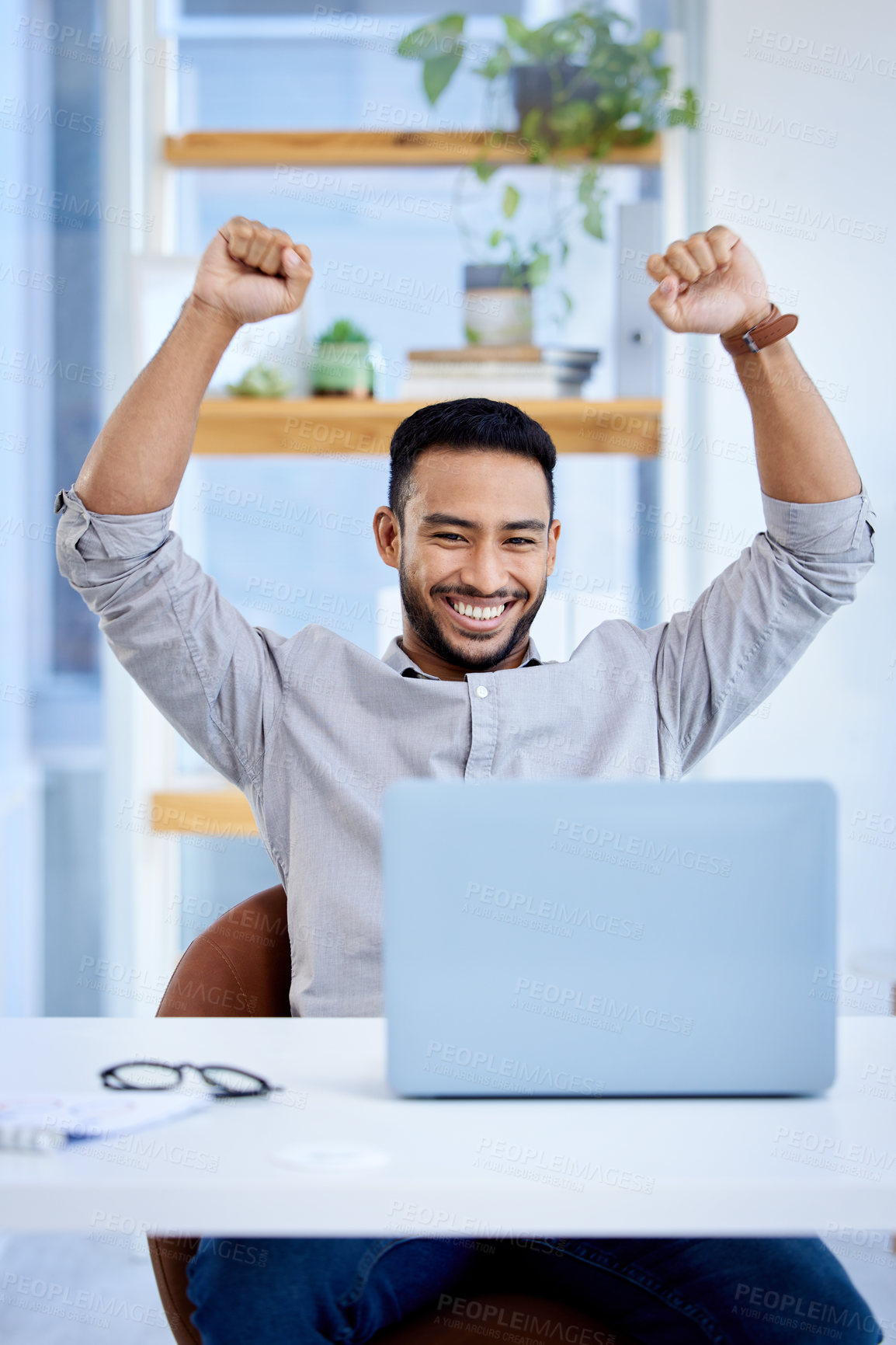 Buy stock photo Happy man, laptop and celebrate business success or win at desk with victory fist for bonus deal. Excited Asian male entrepreneur with tech for profit, competition or online achievement notification 