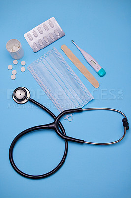 Buy stock photo Studio shot of medical equipment against a blue background