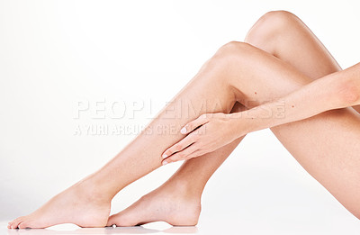 Buy stock photo Cropped shot of an unrecognizable woman's legs in studio against a grey background