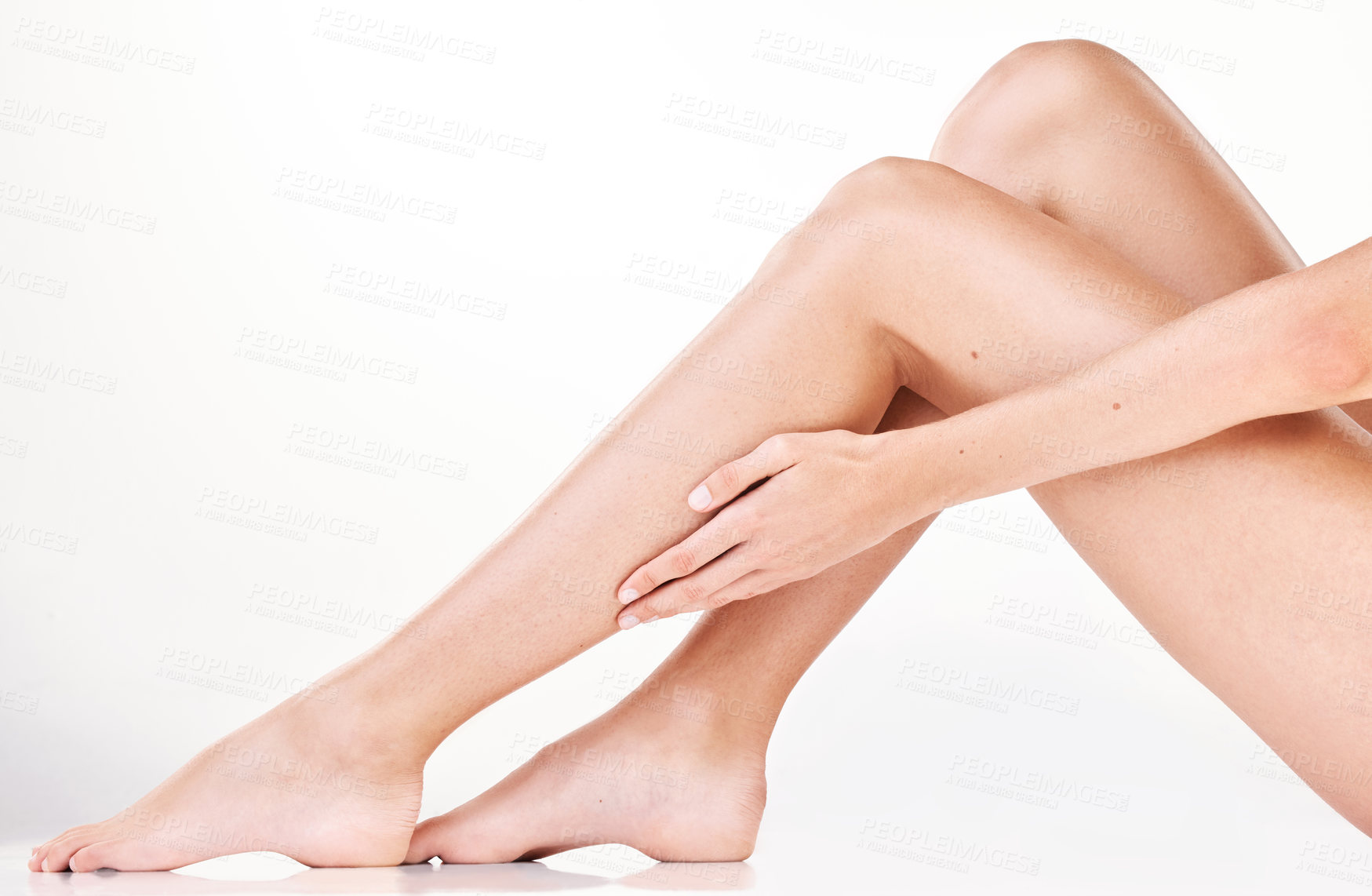 Buy stock photo Cropped shot of an unrecognizable woman's legs in studio against a grey background