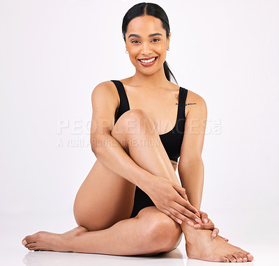 Buy stock photo Full length portrait of an attractive young woman posing in studio against a grey background