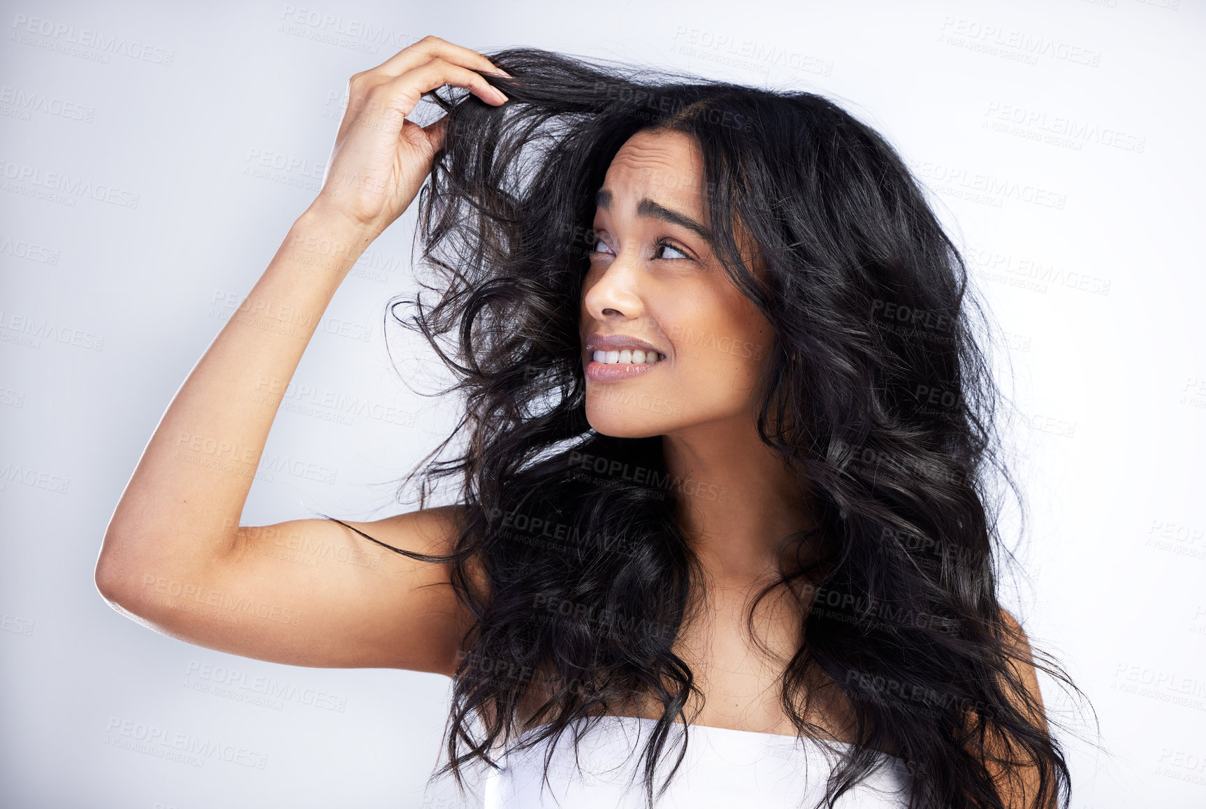 Buy stock photo Frustrated, woman and hair loss in studio for care, crisis and unhappy with treatment. Model girl, thinking and stress for texture, split ends and confused or upset for damage by white background  