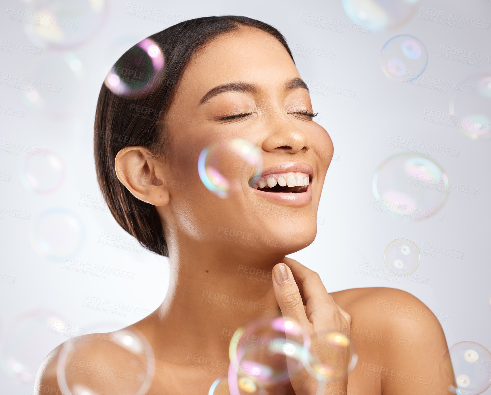 Buy stock photo Studio, bubbles and beauty for calm woman, clean and grooming on white background. Cosmetology, smile and confidence for relax female model, dermatology and salon treatment for skincare or wellness
