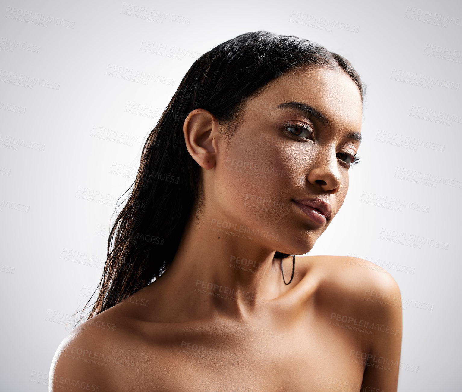 Buy stock photo Hair, portrait and skincare with woman in shower on white background for shampoo or treatment. Beauty, cosmetics and dermatology with serious person in bathroom for cleaning, hygiene or washing