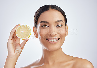 Buy stock photo Skincare, portrait or happy girl with lemon in studio wellness, dermatology or vegan facial on white background. Fruit, face or model with sustainable beauty, citrus or eco friendly cosmetic product