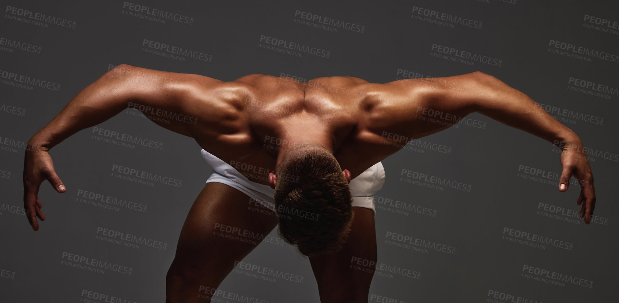 Buy stock photo Pose, bodybuilder and shoulders in studio for exercise, training and fitness for health. Sportsman, athlete and shirtless for competition or event by dark background for transformation and workout