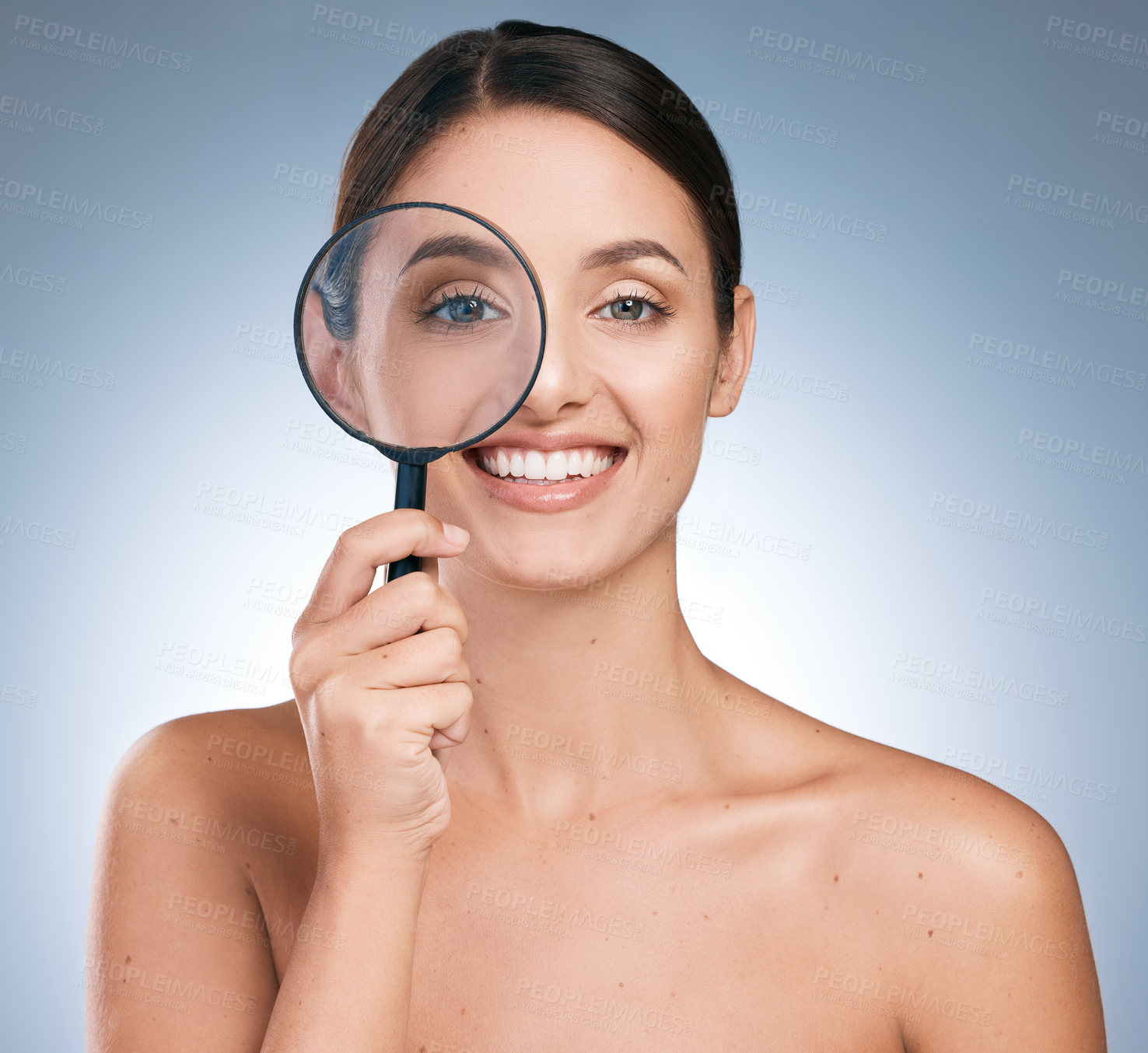 Buy stock photo Woman, portrait and magnify glass for skincare or beauty, filler or anti aging on blue background. Cosmetology or spot control for treatment, pamper or dermatology for female person in studio