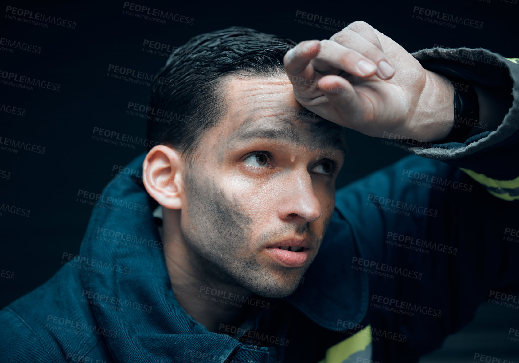 Buy stock photo Working, firefighter or man with job in studio, thinking and planning for rescue operation. Fireman, idea and thoughtful for emergency response, accident and disaster in uniform by black background