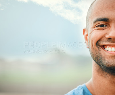 Buy stock photo Closeup portrait of a handsome young male athlete standing outside on a sports field