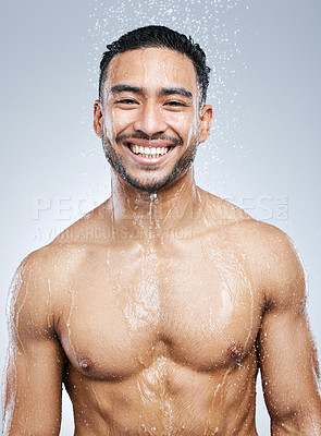 Buy stock photo Portrait of man in shower with smile, cleaning and hygiene for healthy body and studio backdrop. Water, skin and hair care, happy male model washing with skincare on background with bathroom spa.