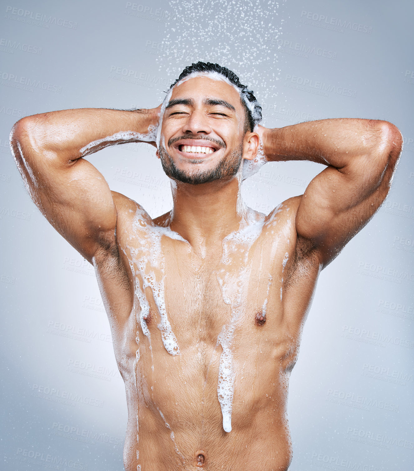 Buy stock photo Cosmetics, man and washing hair for hygiene, grooming and self care or cleaning studio grey background. Wellness, male person and water with shampoo showering for body health and haircare with foam