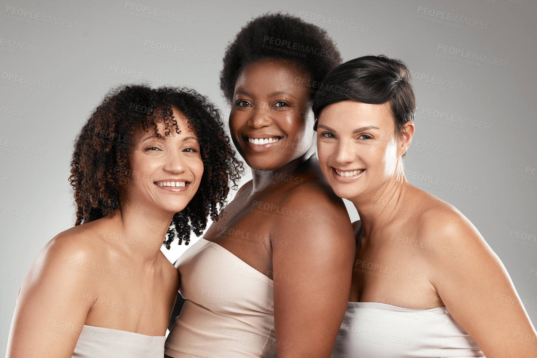 Buy stock photo Portrait, smile and women with skincare in studio, wellness shine and cosmetic inclusion for beauty. Support, friends and people with dermatology for glowing skin, group diversity and gray background