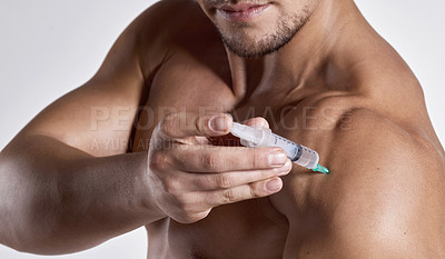 Buy stock photo Cropped shot of a man injecting himself on his shoulder