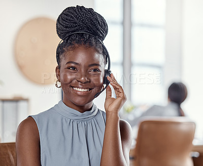 Buy stock photo Shot of a young woman using a headset in a modern office