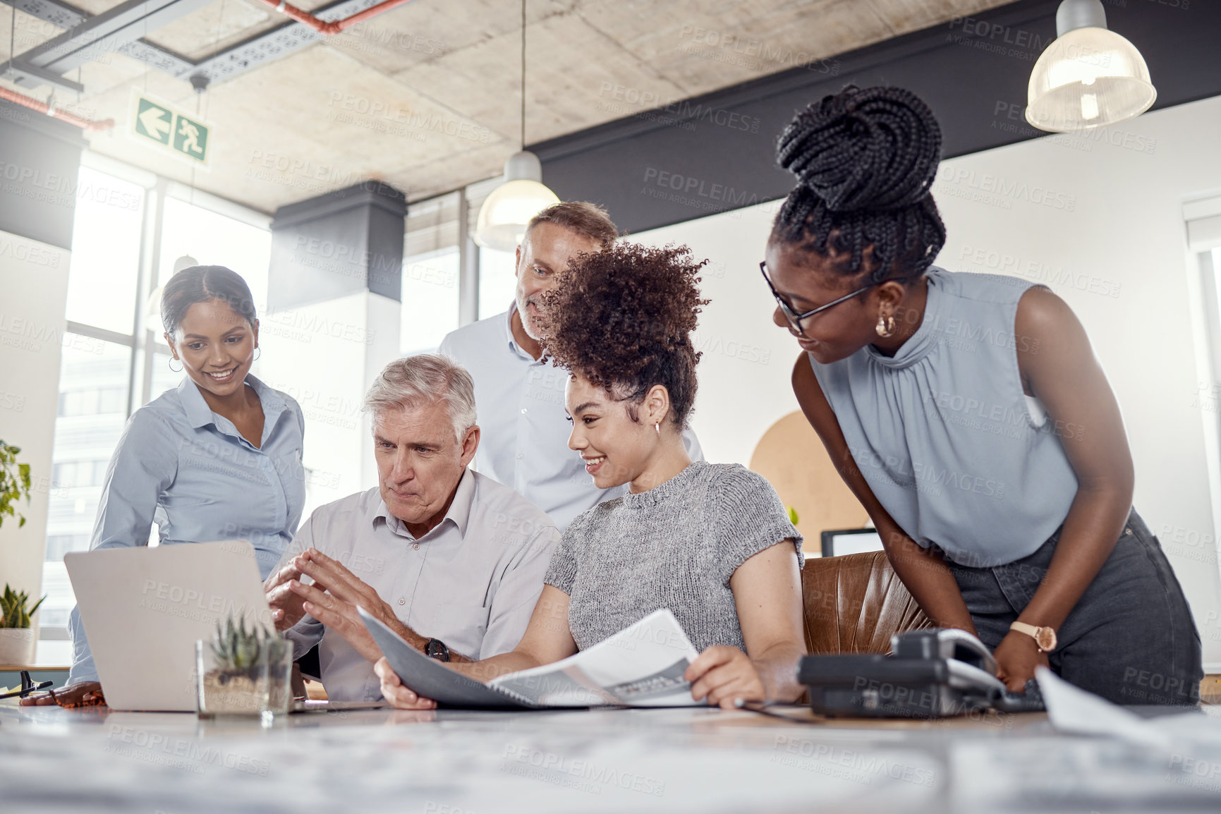 Buy stock photo Shot of a group of businesspeople having a meeting in a modern office