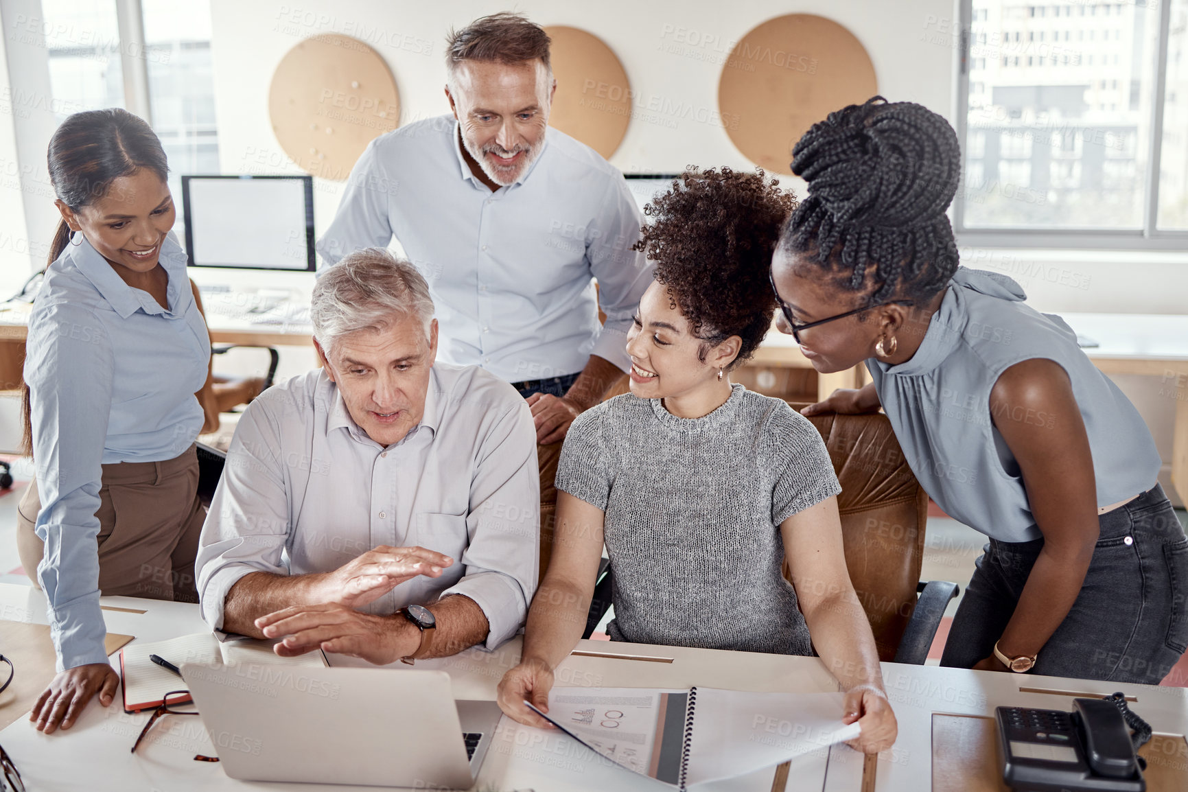 Buy stock photo Shot of a group of businesspeople having a meeting in a modern office